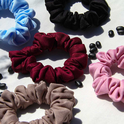 athletic-scrunchies in red, black, pink, and blue.