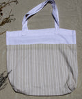 White and beige tote bag