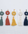 All five different large tassels with the matching card