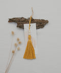 Mustard Tassel Ornament with "presence" card