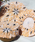 Bowl Covers in different sizes made with orange shweswhe fabric.