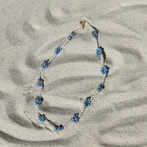 Blue Daisy Chain in the sand