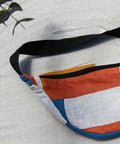 Red, gray, and blue patterned moonbag